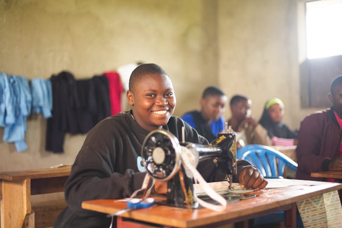 Volunteer working with community in Uganda